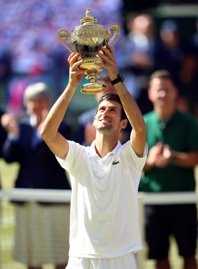 Novak Djokovic Holding 2018 Wimbledon Trophy