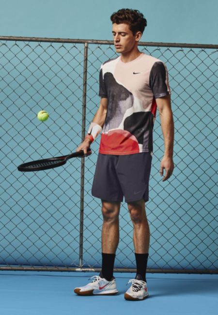 Model in NikeCourt Challenger Short Sleeve Top
