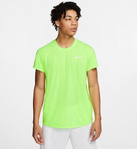Model in Nike Court Challenger Short Sleeve Tennis Top Ghost Green