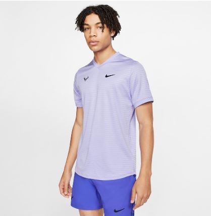 Model in Nike Rafa Court Challenger Short Sleeve Top Purple Pulse