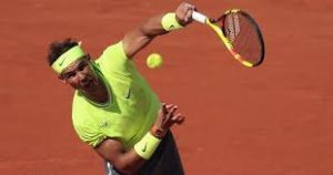 Rafa Nadal serves the ball at Roland Garros