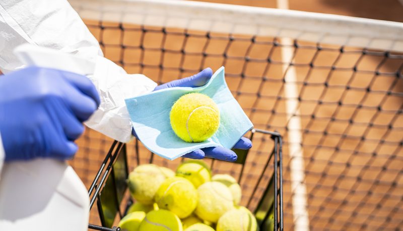 Disinfection of tennis balls close up (VLADIMIR VLADIMIROV / GETTY IMAGES)